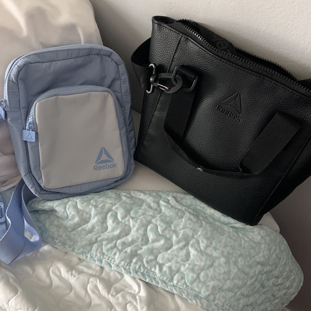 Black and blue Reebok boat purse travel bags